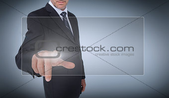 Businessman selecting a transparent screen