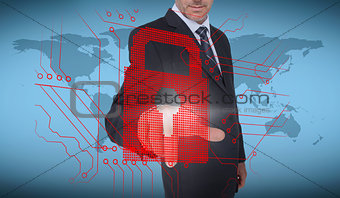 Businessman selecting a red padlock