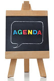 Agenda written on a blackboard with colored letters