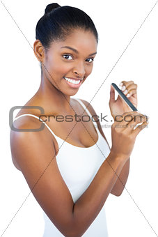 Woman using nail file
