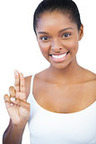 Woman showing moisturiser on her fingers