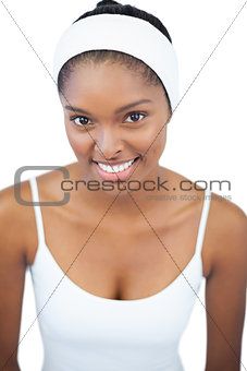 Smiling woman wearing white headband