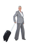 Businesswoman with her luggage