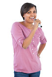 Woman singing with her microphone
