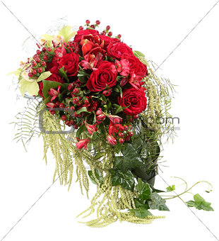 Flower Arrangement with red roses and decorative Hypericum. Flor