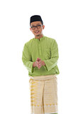 Malay male greetings during hari raya  with isolated white backg