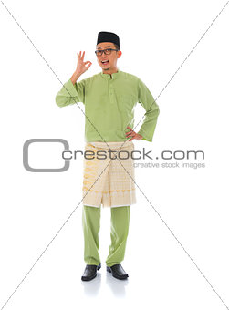 indonesia male with ok sign during ramadan isolated white backgr