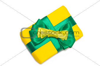 Yellow gift box with green ribbon