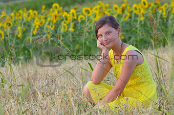 beautiful girl on field in summer