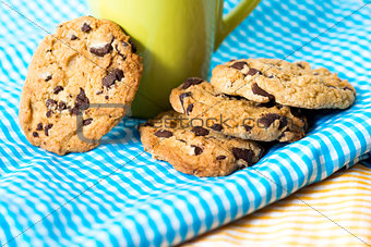 Chocolate chips cookies with a drink 