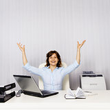 Happy woman in the office