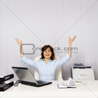 Happy woman in the office