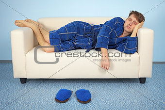 Man is resting at home after work