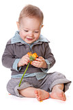 Smiling baby with flower