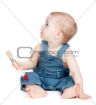 Small baby worker with paint brush