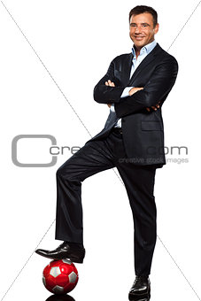 one business man standing  foot on soccer ball