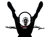 woman exercising pilates ring