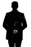 rear view silhouette man portrait holding a rose flower