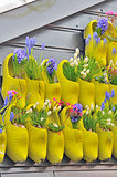 traditional yellow wooden shoes with colorful flowers
