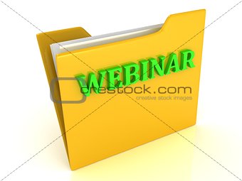 WEBINAR bright green letters on a yellow folder with papers