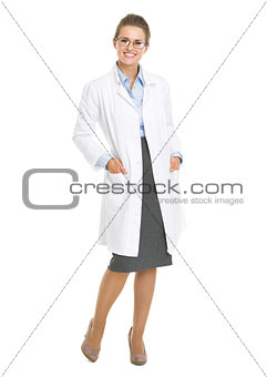 Full length portrait of woman ophthalmologist doctor wearing gla