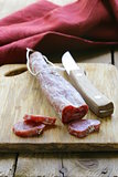 Still life of delicacy salami - rustic style