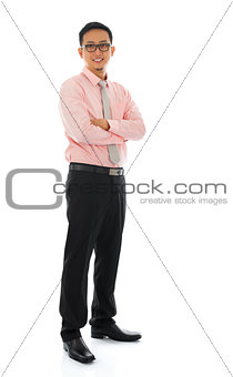 Asian businessman standing isolated