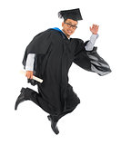 Asian university student in graduation gown 