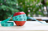 Apple and measuring tape 