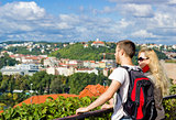 Young couple observing Prague city, Czech Republic