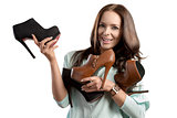 smiling woman with shoes assortment 