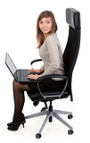 girl in a chair with a laptop
