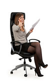 beautiful girl is sitting in an office chair