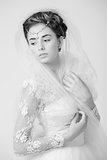 Black and white dreamy portrait of a beautiful bride