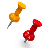 Red and yellow pushpins