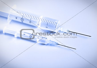 two syringes with remedy