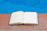 summer reading near pool