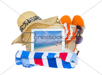 sunbathing accessories  with sea on tablet