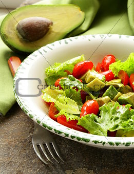 salad with avocado and cherry tomatoes