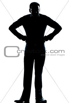 silhouette man full length angry hands on hips