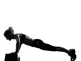 woman exercising step aerobics push ups fitness workout