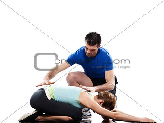 yoga instructor positioning woman adho mukha virasana child pose