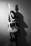 Female guitar player black and white