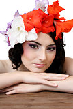 Beautiful young woman with flowers in their hair