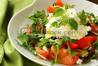 salad with tomato basil and goat cheese