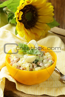 egg salad with quail eggs, cucumber and sausage