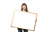 Happy young girl with blank whiteboard