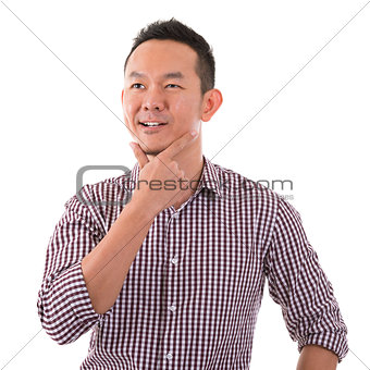Asian man having a thought