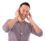 Asian man listening to mp3