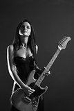 Beautiful female guitar player black and white